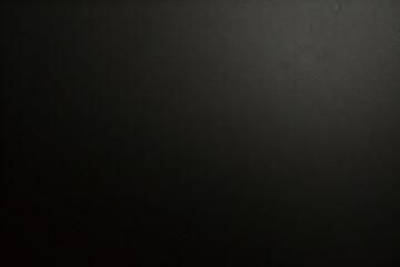 Black foil gradient texture background with uneven surface