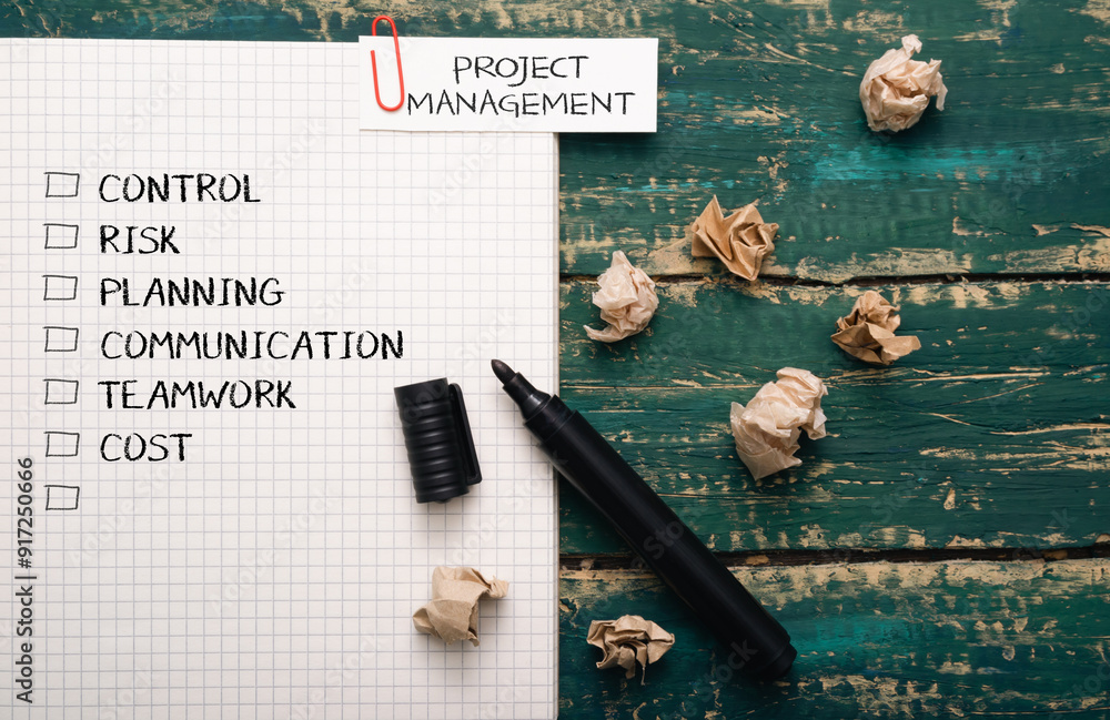 Poster a piece of paper with a list of project management tasks written on it