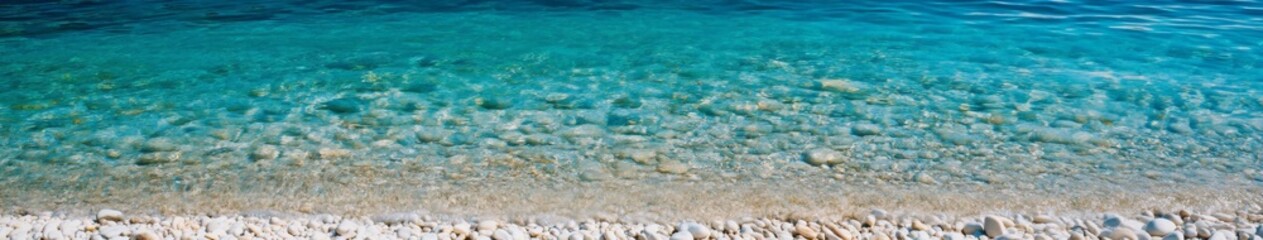 Fototapeta premium Pristine Turquoise Waters and White Pebbles: A Crystal Clear Vision of Nature's Purity and Serenity, Landscape, 4K Wallpaper