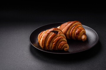 Delicious crispy sweet croissant cornet with chocolate