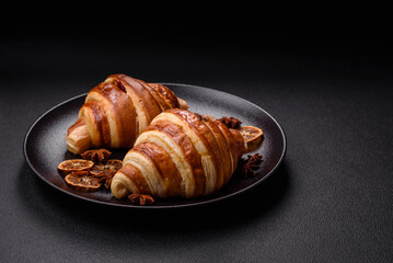 Delicious crispy sweet croissant cornet with chocolate