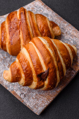 Delicious crispy sweet croissant cornet with chocolate