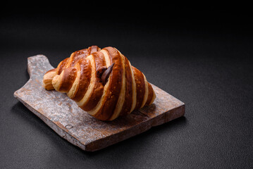 Delicious crispy sweet croissant cornet with chocolate