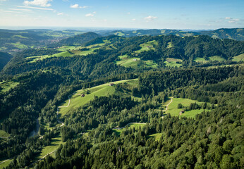 aerial panoramic view of the Nagelfluh mountain chain with Hochgrat summit next to Oberstaufen,...