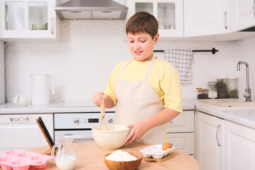 A child baking delicious treats in a bright, modern kitchen filled with joyful energy