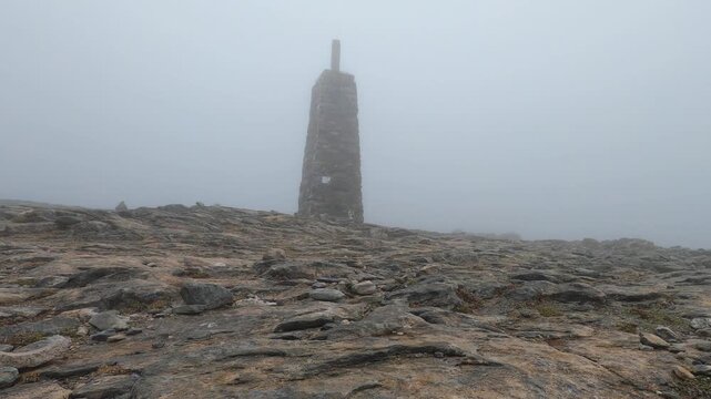 Snowy wind and fog on Maroma peak in thunderstorm day, Sierra Tejeda, Spain 