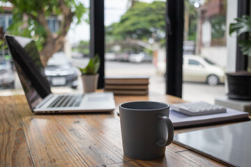 Inside the office there is a desk that is prepared for businessmen to start working every morning. A comfortable and ready-to-work desk idea to start your work every morning with joy.