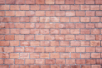 Decorative masonry made of red brick, background.