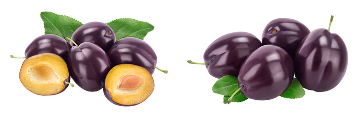fresh purple plum and half with leaves isolated on white background with full depth of field