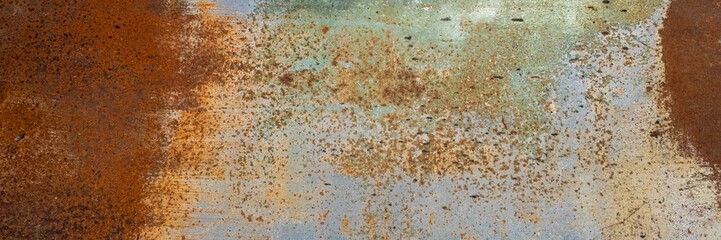 A close-up of rust and corrosion on a metal surface illustrating decay and industrial aging