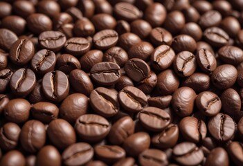 Obraz premium Close-up of roasted coffee beans, with their rich brown color and textured surfaces filling the frame