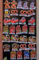 Fototapeta premium Magnets with Alsatian half timber houses at a souvenir store, Colmar, France