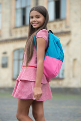 Back to school. Teen girl with backpack going to school. Education and knowledge. Girl pupil with bag at secondary school outdoor. Study time. September 1. College education. Curricular activities