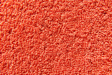 Pile of Textured Pink Fabric Creating a Soft, Vibrant Background During Bright Daylight
