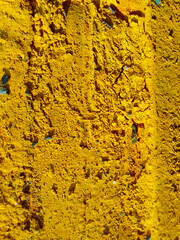 Textured Background of Yellow Polyurethane Foam Remnants From a Sandwich Panel in an Industrial...