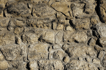 Ancient Stone Wall Constructed From Weathered Boulders in a Historic Location