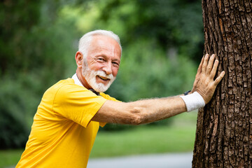 Healthy senior man exercising outdoors.