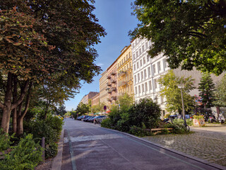 Beautiful renovated pre-WWII residential buildings in a quiet street in Prenzlauer Berg neighbourhood in Berlin, Germany