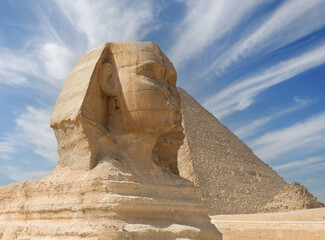 The great Sphinx and the Pyramid of Khufu at Giza. Egypt.