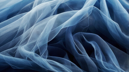 Obraz premium Light airy blue fabric background made of organza or tulle with beautiful folds, fabric texture with waves. 