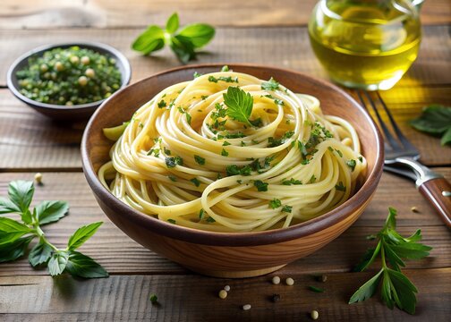 A simple yet elegant bowl of linguine lightly coated in olive oil and sprinkled