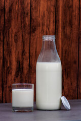 bottle of milk and a glass of milk