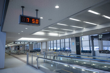 empty walkway inside departure terminal of haneda airport terminal 3