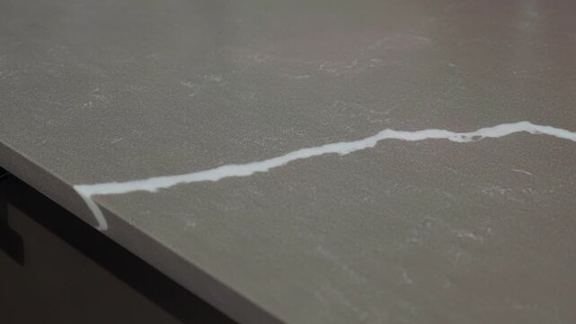 Trendy gray quartz stone with luxury background texture. Kitchen countertops with modern interior design and counters. Nobody