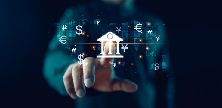 Global currency exchange concept, Businessman touch on bank world map and dollar yuan yen euro and pound sterling sign. Global business, international trading currency, world economy money, transfer.