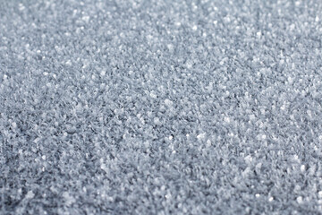 Photo of a surface covered in frost.