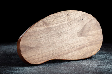 Vintage cutting board. Accessories for cooking at home. Board for cutting products. Cutting board for steaks. Product from different types of wood.