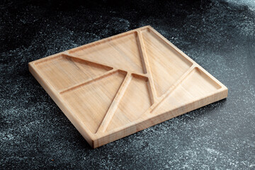 The sideboard is made of wood for serving snacks, fruits, nuts, cheeses, meats and original serving of main dishes. Luxury products from hard and exotic wood species. Accessories for a modern kitchen.