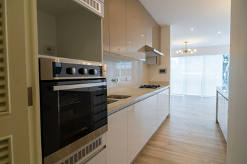 apartment kitchen with wall ,base units and dinning table