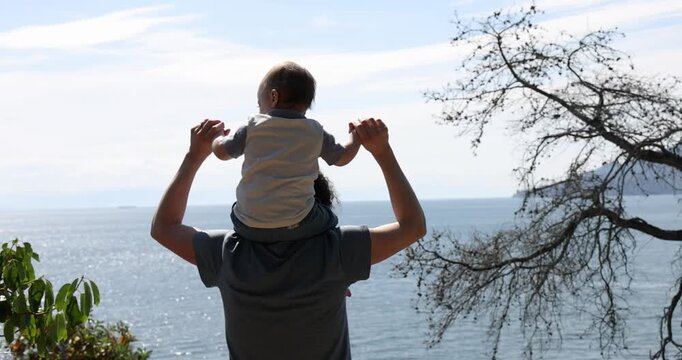 Mother And Son Bonding Time. Lighthouse Park, West Vancouver, British Columbia, Canada.