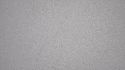 Small cracks on the white wall