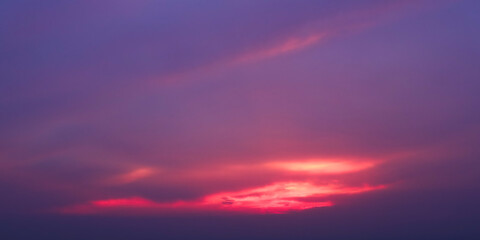Beautiful dramatic scenic after sunset sky background. Colorful sunset with clouds in the sky.