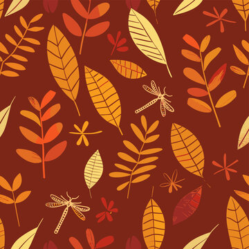 Seamless pattern with autumn leaves branches and dragonflies in warm orange yellow and red hues on a dark red background This cheerful and vibrant design is perfect for textile prints wallpaper or pac