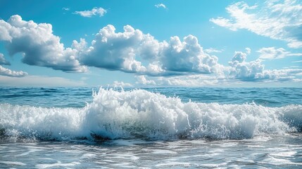 Fototapeta premium Powerful foamy sea waves rolling and splashing over water surface against cloudy blue sky