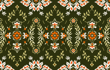 A seamless pattern featuring a vibrant floral design on a dark green background The pattern is composed of orange and white flowers and leaves arranged in a symmetrical design This repeating motif wou