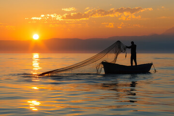 A native fisherman casts his net from a boat at sunset