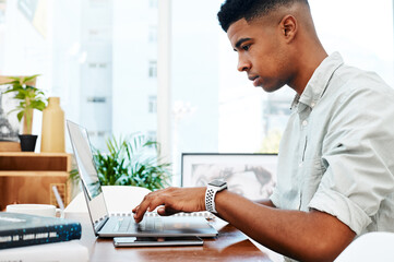 Man, typing and laptop at desk for business, creativity and article for startup in office. Blog, journalist and technology for social media and writing or email for career or connection in workplace