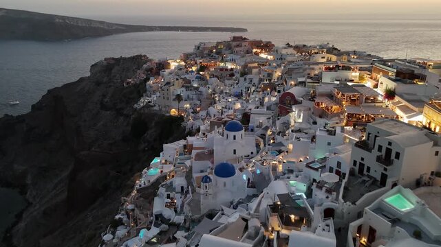 Aerial view of Oia village at sunset, Santorini island, Greece