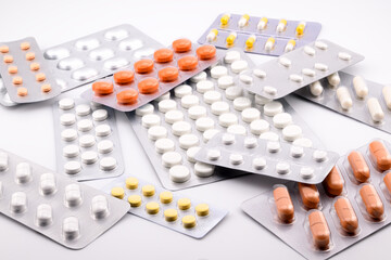 many multi-colored tablets in a blister pack
