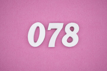  The numbers are made of white painted wood. Laying on the floor was pink paper.