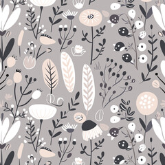 Seamless pattern with hand-drawn floral elements in a whimsical style featuring delicate flowers leaves and berries on a gray background. Perfect for fabric wallpaper or any creative project