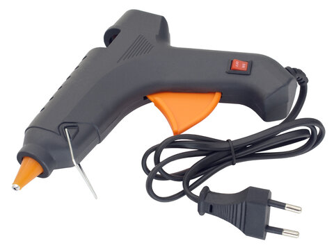 Electric hot glue gun isolated on white