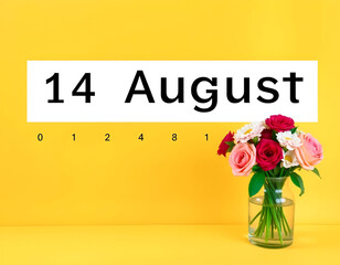 Calendar with text 14 august on yellow background and with a vase of flowers
