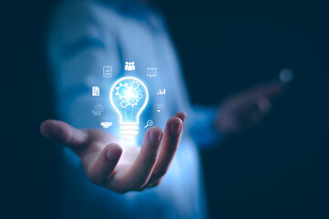 Business solution idea concept. Businessman  creative light bulbs with marketing network, planning...
