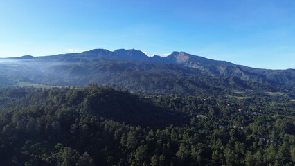 Wide aerial view of hills and mountains