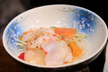 Delicious Assortment of Fresh Sashimi in a Traditional Bowl